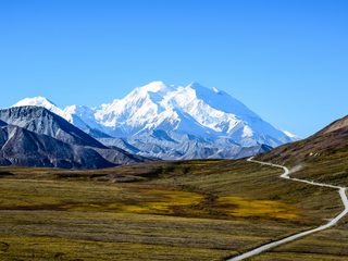 20210208153825-Clear sky with park road leading to Denali.jpg